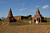 The cluster of red brick temples, named Khay-min-gha on the map on the North plain of Bagan. Myanmar. 